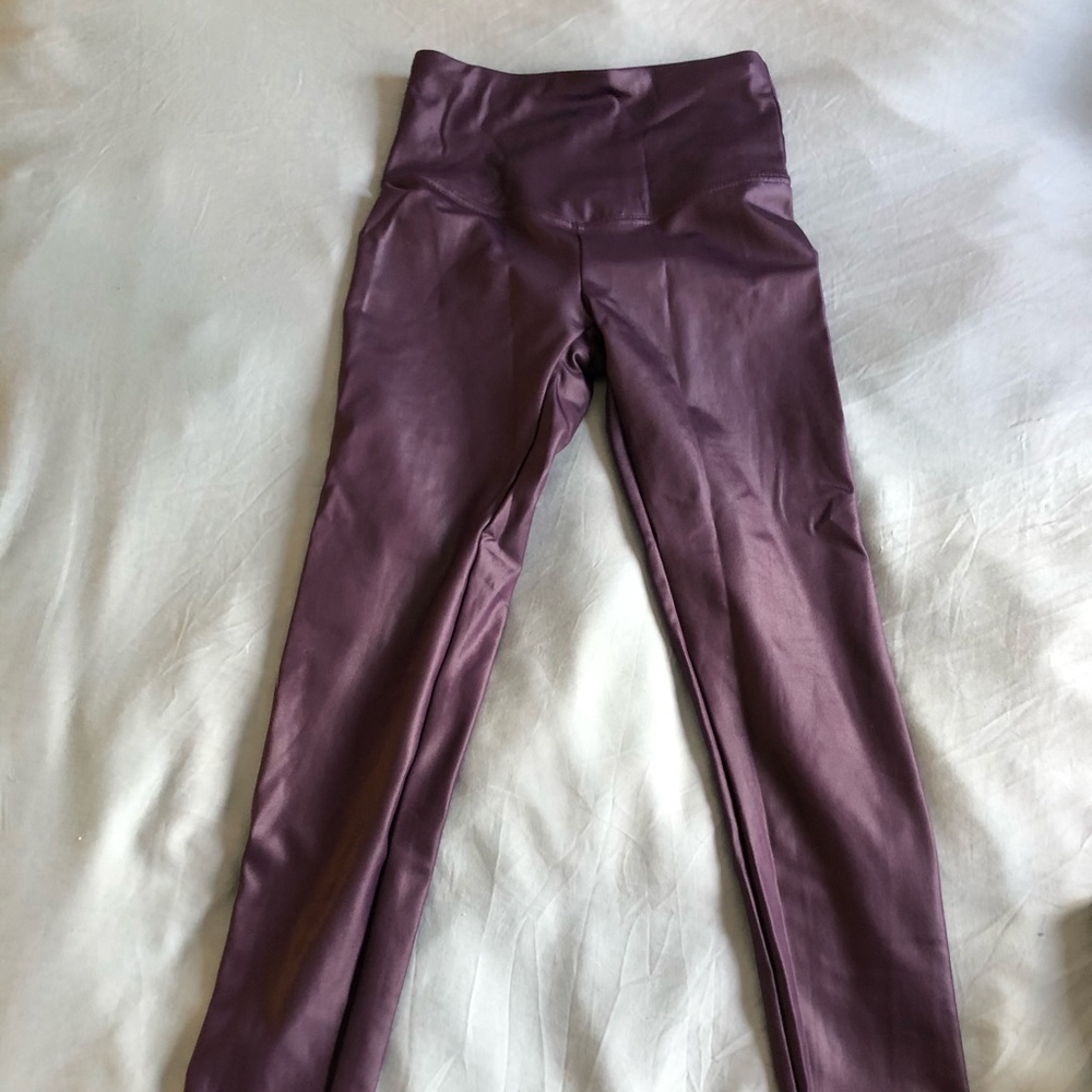 Shiny purple leggings, never worn